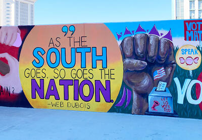 A section of the wall mural featured outside of an SPLC office.